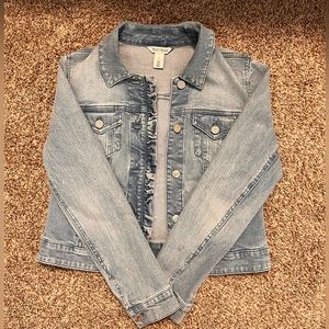 Never worn, brand new jean jacket! Super stylish with cute ruffles!